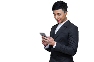 Portrait of Young Asian businessman holding mobile phone and smiling on white background with clipping path