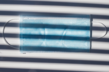 medical mask with line shades on a white background