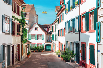 Fototapeta na wymiar Cosy colorful street of historic old town in Basel, Switzerland