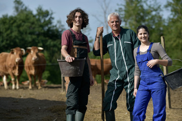 Young people spending green vacation at the farm