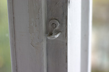 hardware elements of an old wooden window