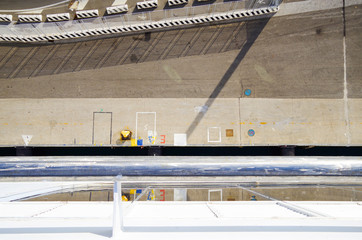 Detail or birdseye view from top deck of cruiseship or cruise ship liner along portside onto pier...
