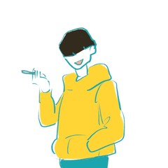 タバコを吸うパーカーを着た若い男性１