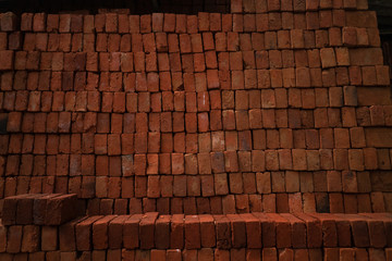Czerwone stare cegły tworzące ściane, teksturę, tło. - obrazy, fototapety, plakaty