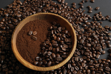 aromatic coffee beans in a wooden plate