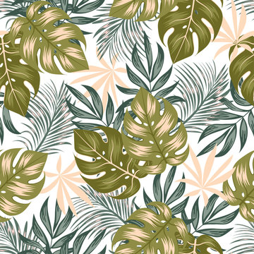 Abstract seamless tropical pattern with bright plants and leaves on a delicate background. Beautiful print with hand drawn exotic plants. 
Vintage pattern. Printing and textiles. 