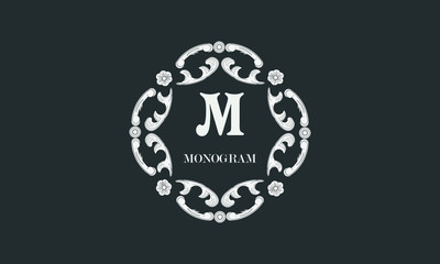 Vintage flower monogram with the letter M. Exquisite three-dimensional logo. Luxury frame for business sign, label, boutique brand, hotel, restaurant, heraldry.