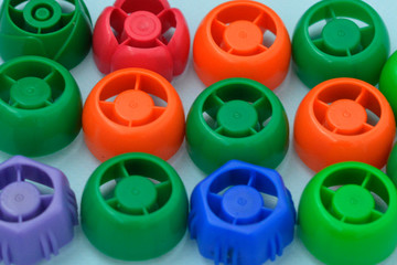 multi-colored plastic corks , zero life-style waste, recycling garbage, environmental awareness