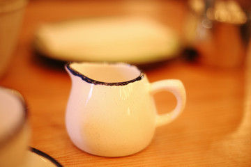 White clay jug on the table