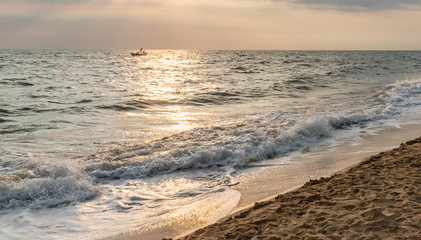 Fototapeta na wymiar Sunset beautiful beach with tide.