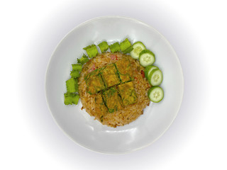 Shrimp Paste Fried Rice cut into carrots, sliced ​​and fragrance, topped with fried egg, Cha Om served with betel nuts and fresh green gauze on white background with work path.