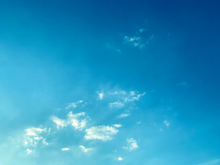 Blue turquoise sky with small clouds. Backdrop for a banner