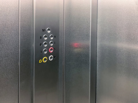 Metal silver elevator with buttons