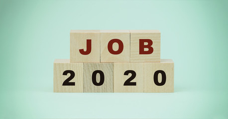 job 2020 text writting on wooden blocks global problem of uneployment business concept