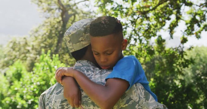 Father hugging his son
