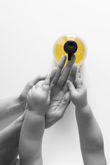 adult woman helping baby child baby child washing hands with antibacterial liquid soap dispenser. Coronavirus (Covid-19) preventive measures top view concept - top view - flat lay - banner