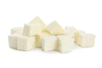 Tasty cut feta cheese on white background