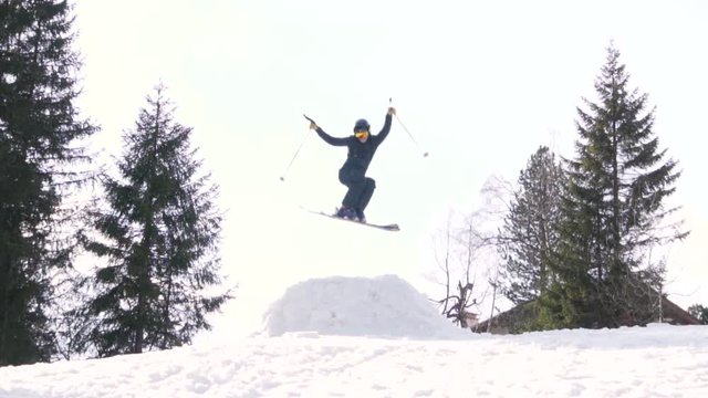 Male skier does Big air jump in Slow motion, St. Anton - Austria