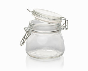 open empty glass jar with metal lock isolated on white