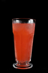 Frozen fresh fruits drinks. Fresh fruits, juice drinks isolated on black background. iced drink. summer drink