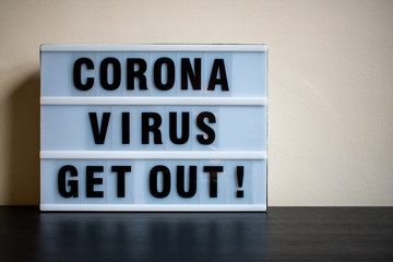 Coronavirus text on lightbox with copy space 