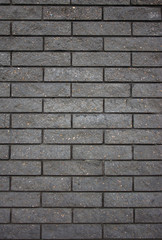 gray black smooth brick wall background for text