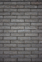 gray black smooth brick wall background for text