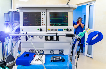 Mechanical ventilation equipment. Screen with results. Pneumonia diagnosting. Ventilation of the lungs with oxygen. COVID-19 and coronavirus identification. Pandemic.