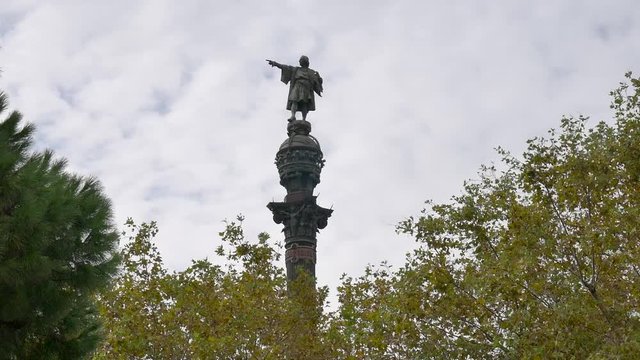 Barcelona's monument tower surrounded by tree in the heart of the city