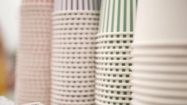 Empty disposable paper cups for coffee ice cream and other cold