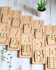 Wooden counting and writing trays - learning resource for educating littles on number writing, fine motor skills, hand eye coordination, mathematical skills. Montessori materials. Counting game