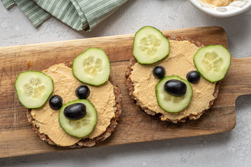 Funny bear toast with cucumber and hummus toasts
