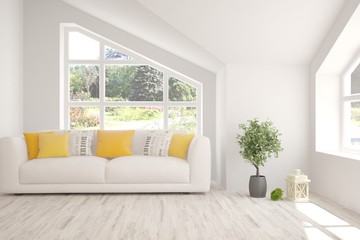 White living room with sofa and summer landscape in window. Scandinavian interior design. 3D illustration