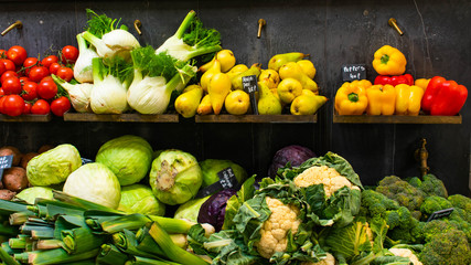 Fresh organic vegetables at a farm shop in Somerset.  Bright vivid range of fruit and veg.