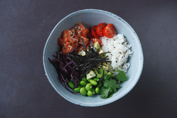 salad bowl with salmon, tomatoes and beans