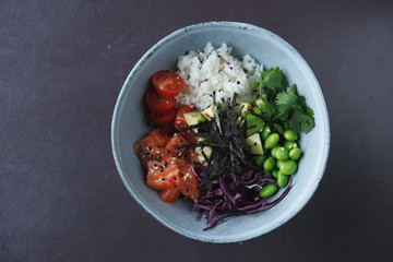 salad bowl with salmon, tomatoes and beans