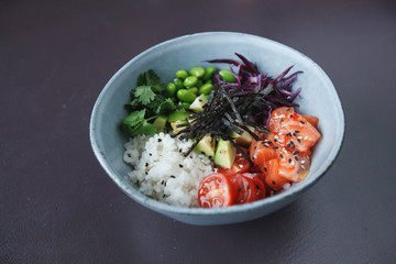 salad bowl with salmon, tomatoes and beans