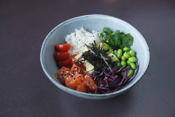salad bowl with salmon, tomatoes and beans