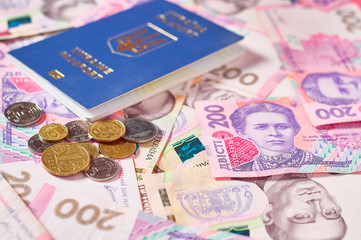 Passport of ukrainian citizen and money. Concept of travel, donation or social payments