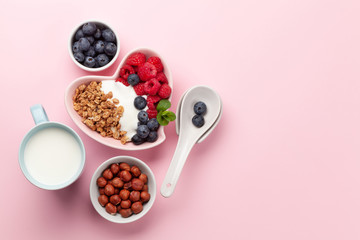 Healthy breakfast with granola, yogurt and berries