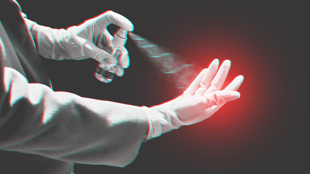 Young woman applying alcohol based mini hand sanitizer spray to remove contagious viruses or gems from her other hand. Personal hygiene concept.