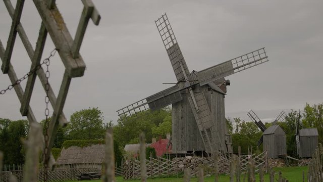 Wide-shot of old wooden windmills, built in 20th century located in Estonia, Saaremaa.