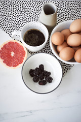 Eggs, black coffee and fruits © 4Media Creations