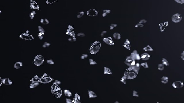 Abstract animation of falling diamonds in slow motion on a black background. 3d animation. 4k. - Powered by Adobe