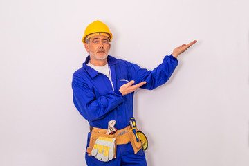 construction worker with tools and helmet isolated on white background