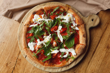 pizza on a wooden board