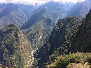Fototapeta premium Beautiful panoramic view of famous mountains machu picchu peru, south america. Inca city, peruvian civilization. Green Landscape, panorama of andes