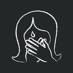 woman crying, covering her mouth with her hands