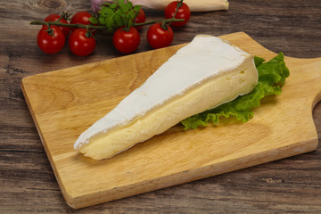 Brie cheese triangle served salad
