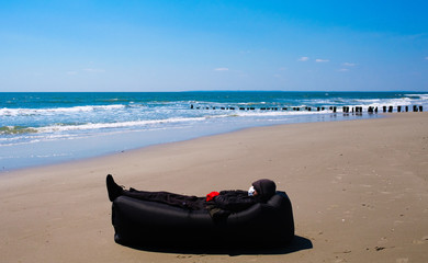 Obraz na płótnie Canvas Beach Sofa Social Distancing